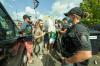 GEOFF ROBINS - AFP via GETTY IMAGES
Protesters confront police during a Liberal campaign event with Prime Minister Justin Trudeau in Cambridge, Ontario, on August 29, 2021.