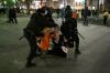 Dmitry Serebryakov - The Associated Press
Police officers detain demonstrators in Moscow on Thursday. Hundreds gathered in many cities to speak up against the invastion of Ukraine and many were detained.