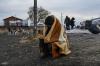 Omar Marques - GETTY IMAGES
A foreign national who escaped Ukraine warms himself with a blanket Tuesday in Medyka, Poland, as he waits for public transport to reach the nearest city.