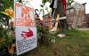 JONATHAN HAYWARD - THE CANADIAN PRESS
Signs are pictured at a memorial outside the Residential School in Kamloops, B.C., on Sunday . The remains of 215 children were discovered buried near the former residential school earlier this month.