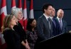 Prime Minister Justin Trudeau listens to a question with Deputy Prime Minister and Minister of Intergovernmental Affairs Chrystia Freeland, Minister of Health Patty Hajdu, Chief Medical Officer Theresa Tam, Minister of Finance Bill Morneau and President of the Treasury Board Jean-Yves Duclos during a news conference on the coronavirus situation, in Ottawa, Wednesday March 11, 2020. THE CANADIAN PRESS/Adrian Wyld