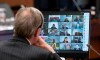 Canadian Members of Parliament are shown on a monitor during a virtual session of the House of Commons Tuesday April 28, 2020 in Ottawa. THE CANADIAN PRESS/Adrian Wyld