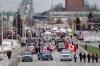 Cole Burston - GETTY IMAGES
Protesters and supporters set up at a blockade at the foot of the Ambassador Bridge, sealing off the flow of commercial traffic over the bridge into Canada from Detroit on Thursday in Windsor.