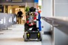 The woman who was attacked in the skywalk poses for a portrait in the area the assault happened. (Mikaela MacKenzie / Winnipeg Free Press)