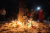 A vigil was held for Anthony Sinclair on Stella Avenue in December following his death. (Mike Sudoma / Winnipeg Free Press files)