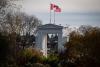 DARRYL DYCK - THE CANADIAN PRESS FILE PHOTO
Canadian and U.S. flags fly atop the Peace Arch monument at the Douglas-Peace Arch border crossing in Surrey, B.C., on Nov. 8, 2021.