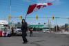 Galit Rodan - Bloomberg
A protester holds a Canadian flag at a demonstration blocking access to the Ambassador Bridge in Windsor on Feb. 9, 2022.