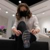 Adrian Wyld - THE CANADIAN PRESS
Deputy Prime Minister and Finance Minister Chrystia Freeland puts her sneakers back on after trying a pair of new shoes before purchasing them at a local shop on April 6, 2022 in Ottawa. Freeland will deliver the federal budget Thursday.