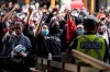 Demonstrators gather outside Toronto Police Headquarters after taking part in a rally protesting the death of Regis Korchinski-Paquet in downtown Toronto, Saturday May 30, 2020. Korchinski-Paquet, 29, fell from the balcony of a 24th-floor Toronto apartment while police were in the home. Thousands of protesters took to the streets to rally in the aftermath of high-profile, police-involved deaths in both Canada and the United States. THE CANADIAN PRESS/Chris Young