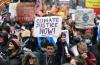 - AFP via GETTY IMAGES
People participate in a protest rally during a global day of action on climate change in Glasgow during the COP26 UN Climate Change Conference.