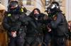 Dmitri Lovetsky - AP
Police officers detain an anti-war protester in St. Petersburg, Russia, Friday, Feb. 25, 2022.