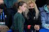 David J. Phillip - AP
Coach Eteri Tutberidze, right, talks to Kamila Valieva, centre, of the Russian Olympic Committee, during a training session at the 2022 Winter Olympics on Sunday.