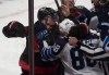 Brady Tkachuk and Nathan Beaulieu get into it during the third period on Thursday. (Adrian Wyld / The Canadian Press)