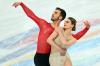 SEBASTIEN BOZON - AFP via GETTY IMAGES
France's Gabriella Papadakis and France's Guillaume Cizeron won gold in the ice dance competition Monday during the Beijing 2022 Winter Olympic Games at the Capital Indoor Stadium in Beijing.