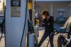 Brandon Bell - Getty Images
A person prepares to pump gas at a Shell gas station in Houston, Texas. Rising gas prices around the world have been attributed to Russia's invasion of Ukraine.