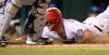 Nick Wass - The Associated Press
The Nationals’ Carter Kieboom slides home safely past Jays catcher Reese McGuire in the eighth inning of Tuesday night’s game in Washington.