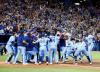 Vaughn Ridley - Getty Images
Blue Jays teammates greet Marcus Semien after his two-run walk-off homer to beat his former club, the Oakland A’s, at the Rogers Centre on Friday night.