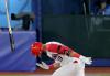 José Bautista gives his trademark bat flip an Olympic spin in Tokyo