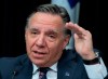 Quebec Premier Francois Legault announces measures to contain the COVID-19 virus, Thursday, March 12, 2020 at the legislature in Quebec City. THE CANADIAN PRESS/Jacques Boissinot