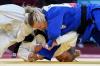 Vincent Thian - AP
Jessica Klimkait of Canada (right) and Kaja Kajzer of Slovenia compete in the women's -57kg judo bronze medal match, at the 2020 Tokyo Olympics on Monday.