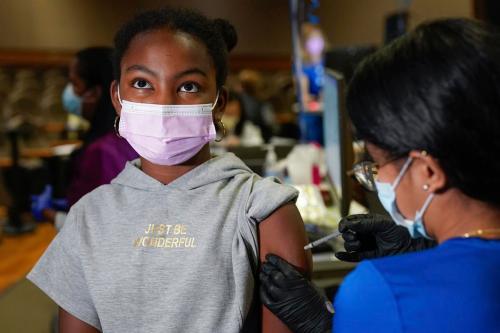 Seth Wenig - The Associated Press
Jenelle Camille, 11, receives her COVID-19 vaccination at in Englewood, N.J., this month. The U.S. was a couple of weeks ahead, but Health Canada has approved the Pfizer vaccine for kids five to 11.