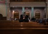 Members of Winnipeg's Ukrainian community attended a vigil at Sts. Vladimir and Olga Ukrainian Catholic Church on Thursday. (Jessica Lee / Winnipeg Free Press)