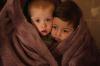 Evgeniy Maloletka - AP
The children of medical workers warm themselves in a blanket as they wait for their relatives in a hospital in Mariupol, Ukraine on March 4.