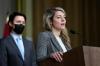 Justin Tang - THE CANADIAN PRESS
Prime Minister Justin Trudeau listens as Minister of Foreign Affairs Melanie Joly speaks during a media availability on the situation in Ukraine, in Ottawa,on Feb. 22, 2022.