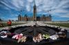 Justin Tang - THE CANADIAN PRESS
Shoes line the edge of the Centennial Flame on Parliament Hill in memory of the 215 children whose remains were found at the grounds of the former Kamloops Indian Residential School at Tk’emlups te Secwépemc First Nation in Kamloops, B.C., on Sunday, May 30, 2021.