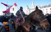 Adrian Wyld - THE CANADIAN PRESS
Two demonstrators ride horses past parked trucks and Parliament Hill during a protest against COVID-19 restrictions in Ottawa on Feb. 5, 2022. Ukraine’s genuine struggle for sovereignty puts the lie to the false clamour for “freedom” from a fringe group at home, Martin Regg Cohn writes.