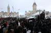 Steve Russell - Toronto Star
Police form a line as they clear protesters from the area surrounding Parliament Hill in Ottawa on Feb. 19, 2022. The Ontario Superior Court ordered several financial institutions, fundraising platforms and digital asset platforms to halt all financial transactions from the bank accounts and digital wallets belonging to protest organizers.