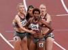 Adrian Wyld - THE CANADIAN PRESS
Canada’s Maddy Price (left), Alicia Brown, Kyra Constantine and Sage Watson (right) wait for their results in the women's 4 x 400m relay race heat at the 2020 Tokyo Olympics.