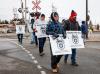 Jeff McIntosh - THE CANADIAN PRESS
Workers picket the Canadian Pacific Railway headquarters in Calgary on Sunday.