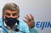 ANNE-CHRISTINE POUJOULAT - AFP via GETTY IMAGES
IOC president Thomas Bach addresses journalists during a news conference at the Main Media Center on Thursday ahead of the Beijing Olympics.