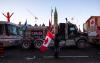 Justin Tang - The Canadian Press
Trucks participating in a cross-country convoy protesting measures taken by authorities to curb the spread of COVID-19 are seen parked on Wellington Street in front of Parliament Hill in Ottawa, on Friday, Jan. 28, 2022.