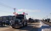 David Lipnowski - The Canadian Press
Protesters of COVID-19 restrictions, and supporters of Canadian truck drivers protesting the COVID-19 vaccine mandate cheer on a convoy of trucks on their way to Ottawa, on the Trans-Canada Highway west of Winnipeg on Jan. 25.