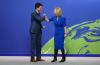 Sean Kilpatrick - THE CANADIAN PRESS
Prime Minister Justin Trudeau is greeted by UK Foreign Secretary Liz Truss as he arrives to COP26 in Glasgow, Scotland, on Nov. 1, 2021. Trudeau has been pointing to Canada as the only oil and gas producer that has figured out how to slap a significant and transparent price on carbon that escalates steeply and redistributes the revenues back to regular people, Heather Scoffield writes.