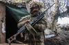 Andriy Dubchak - The Associated Press
A Ukrainian soldier stands at the line of separation from pro-Russian rebels, Donetsk region, Ukraine, on Monday.