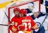 CP
Calgary Flames' Josh Leivo (27) celebrates his goal with teammate Sean Monahan in front of Winnipeg Jets goalie Laurent Brossoit and Neal Pionk during first period NHL hockey action in Calgary, Alta., Saturday, March 27, 2021. (Todd Korol / The Canadian Press)