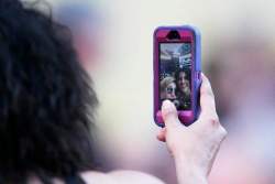 John Woods / Winnipeg Free Press
A fan takes a selfie with a friend before the Paul McCartney concert.