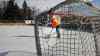 JOE BRYKSA / WINNIPEG FREE PRESS Clare Jago cleans the ice on the Pembina Manitou outdoor rink.