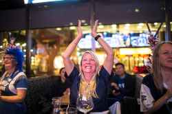 Bombers fan Donna Collins celebrates the Bombers