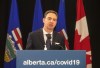 New Alberta Health Minister Jason Copping gives a COVID-19 update in Edmonton, Tuesday, Sept. 21, 2021. THE CANADIAN PRESS/Jason Franson