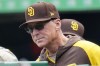 FILE - San Diego Padres manager Bob Melvin stands in the dugout during the first inning of a baseball game against the Pittsburgh Pirates in Pittsburgh, May 1, 2022. Melvin says he'll have prostate surgery on Wednesday, May 11, 2022, and hopes he misses only part of a forthcoming road trip. He doesn't think he has cancer 