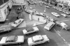 Cars line up in two directions at a gas station in New York City, on Dec. 23, 1973. Canada is leaning towards a new era of 1970's-style stagflation as the pace of economic growth slows yet prices remain stubbornly high, economists say. (AP Photo/Marty Lederhandler, File)