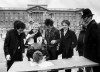 FILE - British group, the Sex Pistols, sign a new recording contract with A&M Records outside Buckingham Palace in London, 1977. In Britain, there are several traditional elements to a royal anniversary: pageants, street parties, the Sex Pistols. Queen Elizabeth II and the Pistols have been linked since the punk pioneers released the song “God Save the Queen” in 1977 during the monarch’s Silver Jubilee. The anti-authoritarian anthem has been re-released to mark the queen’s Platinum Jubilee, 70 years on the throne. (PA via AP, File)