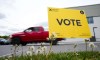 A vote sign is displayed outside a polling station during advanced voting in the Ontario provincial election in Carleton Place, Ont., on Tuesday, May 24, 2022. THE CANADIAN PRESS/Sean Kilpatrick