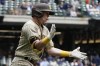 San Diego Padres' Jurickson Profar reacts after hitting a three-run home run during the 10th inning of a baseball game against the Milwaukee Brewers Sunday, June 5, 2022, in Milwaukee. (AP Photo/Morry Gash)