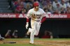 Los Angeles Angels designated hitter Shohei Ohtani (17) runs while lining out to first during the fourth inning of a baseball game against the Boston Red Sox in Anaheim, Calif., Monday, June 6, 2022. (AP Photo/Ashley Landis)