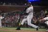 Colorado Rockies pinch-hitter Charlie Blackmon hits a three-run home run off San Francisco Giants pitcher José Álvarez during the sixth inning of a baseball game Tuesday, June 7, 2022, in San Francisco. (AP Photo/D. Ross Cameron)